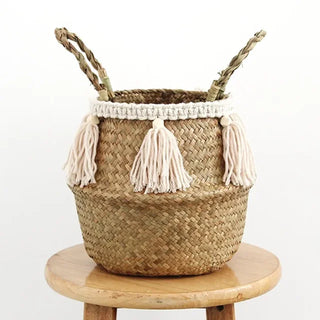 handwoven-natural-seagrass-storage-basket-with handles-and-white-tasselled-fringe-hanging-basket-pot-planter-natural-home-decor